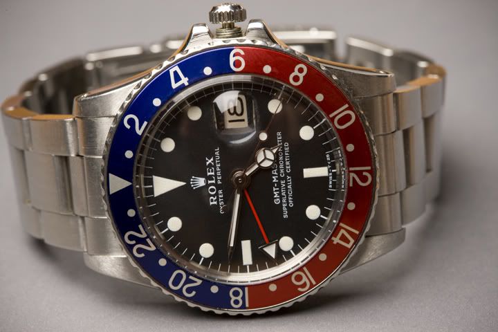 http://i39.photobucket.com/albums/e152/emerfoto/RolexGmt.jpg