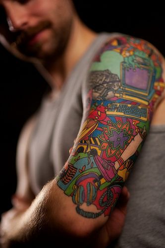 half sleeve tattoos pictures. Tyler Stout Half-Sleeve Tattoo