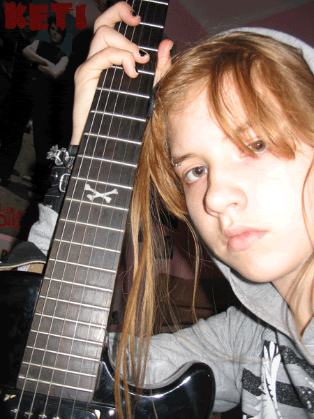 http://i39.photobucket.com/albums/e172/KetiGoth/withguitar-1.gif